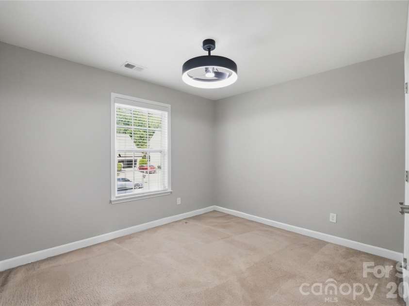5068 Gladiola Way, Tega Cay, SC 29708.  MLS# CAR4371623, YatesRealty ID 26455. Fourth bedroom on second floor