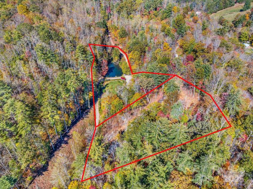226 Fish Pond Lane, Burnsville, NC 28714.  MLS# CAR4326469, YatesRealty ID 2646. Neighboring property seen on the right, 148 Fish Pond MLS 4326600 is for sale and available as well by seller.