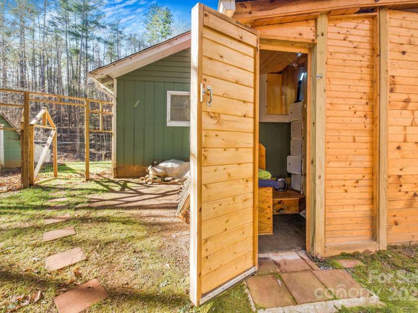 226 Fish Pond Lane, Burnsville, NC 28714.  MLS# CAR4326469, YatesRealty ID 2646. Outdoor shower.