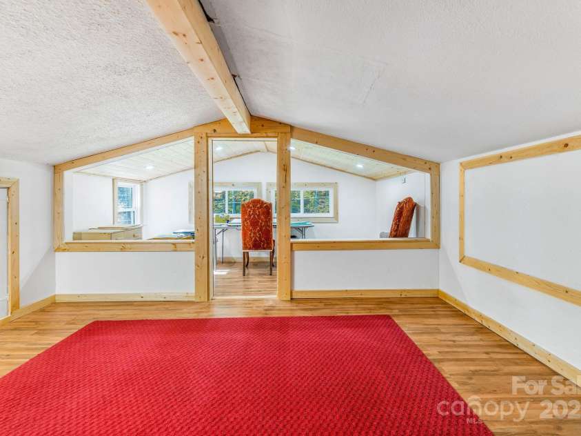 226 Fish Pond Lane, Burnsville, NC 28714.  MLS# CAR4326469, YatesRealty ID 2646. Upstairs office/bedroom/family room/flex space.