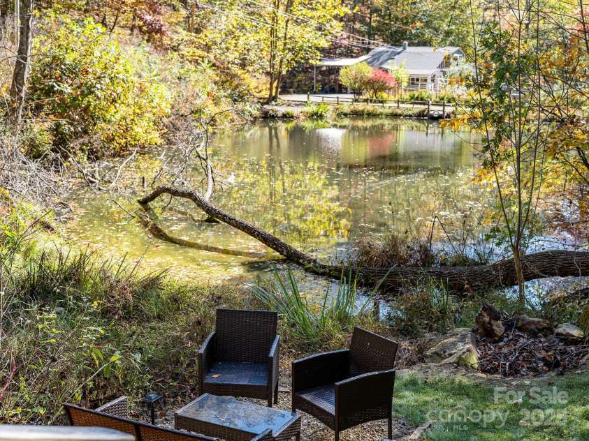 226 Fish Pond Lane, Burnsville, NC 28714.  MLS# CAR4326469, YatesRealty ID 2646. View of house from the studio/cabin
