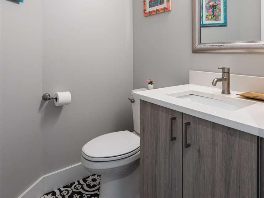 89 Vance Crescent Extension, Asheville, NC 28806.  MLS# CAR4338074, YatesRealty ID 2646. Half Bath with Cute Tile Floor on Main Level