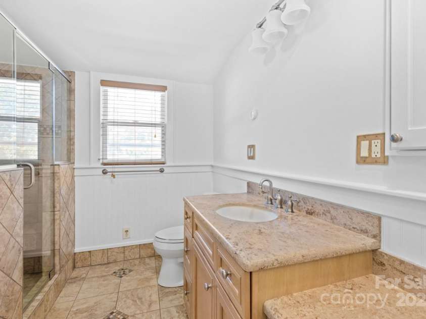 92 Winston Avenue, Asheville, NC 28803.  MLS# CAR4277566, YatesRealty ID 26461. Primary bath