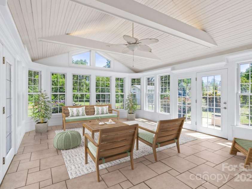 92 Winston Avenue, Asheville, NC 28803.  MLS# CAR4277566, YatesRealty ID 26461. Sunroom - staged