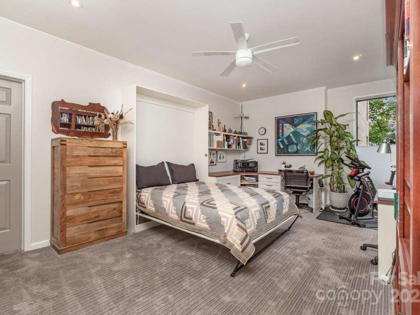 830 Cherokee Road, Charlotte, NC 28207.  MLS# CAR4278493, YatesRealty ID 26462. Large bedroom with murphy bed down