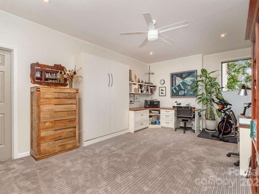 830 Cherokee Road, Charlotte, NC 28207.  MLS# CAR4278493, YatesRealty ID 26462. Large bedroom with murphy bed up