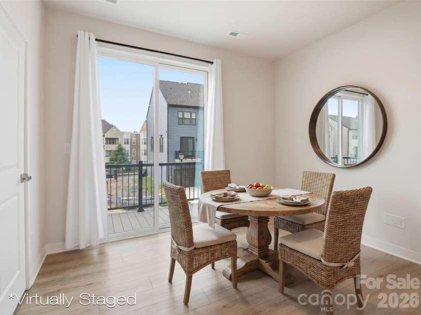 3616 Masonboro Street, Charlotte, NC 28206.  MLS# CAR4386585, YatesRealty ID 26468. 2nd floor dining space - virtually staged
