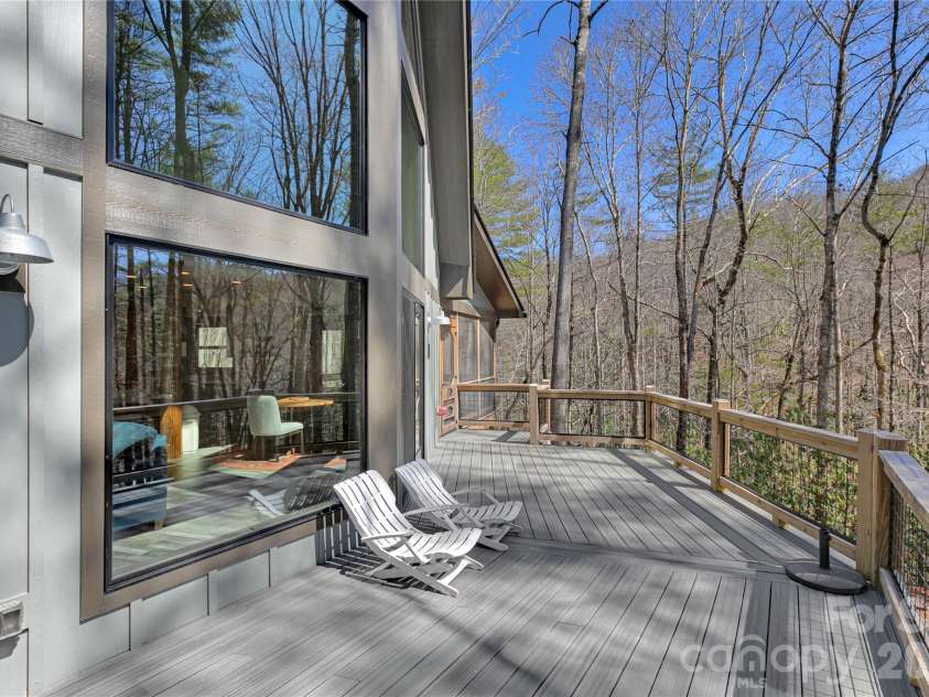 70 Unvdatlvi Court, Brevard, NC 28712.  MLS# CAR4358667, YatesRealty ID 26469. Large Open Deck