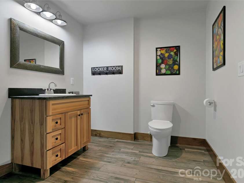 70 Unvdatlvi Court, Brevard, NC 28712.  MLS# CAR4358667, YatesRealty ID 26469. Lower Level Bathroom