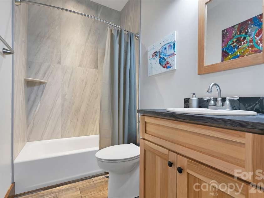 70 Unvdatlvi Court, Brevard, NC 28712.  MLS# CAR4358667, YatesRealty ID 26469. Main level full bathroom