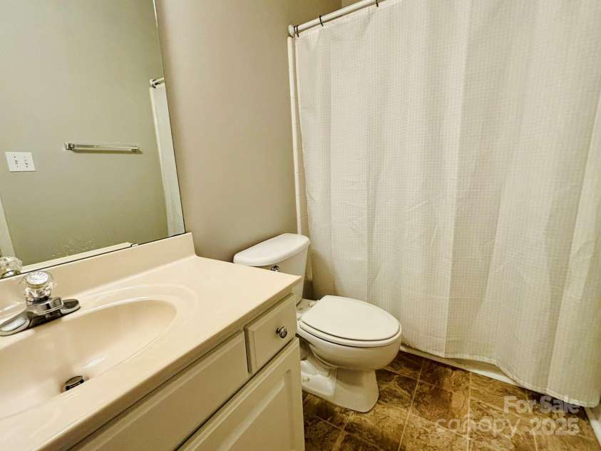 917 Shearer Street, Davidson, NC 28036.  MLS# CAR4280904, YatesRealty ID 26471. Ensuite Bathroom 1