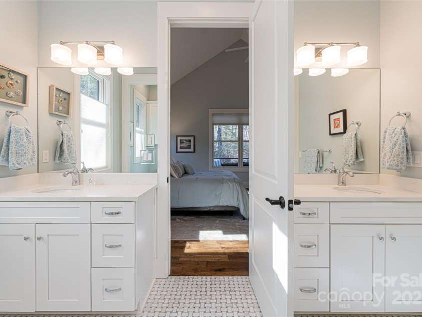 28 Woodland Aster Way, Asheville, NC 28804.  MLS# CAR4212425, YatesRealty ID 26479. Dual sinks and stunning tilework