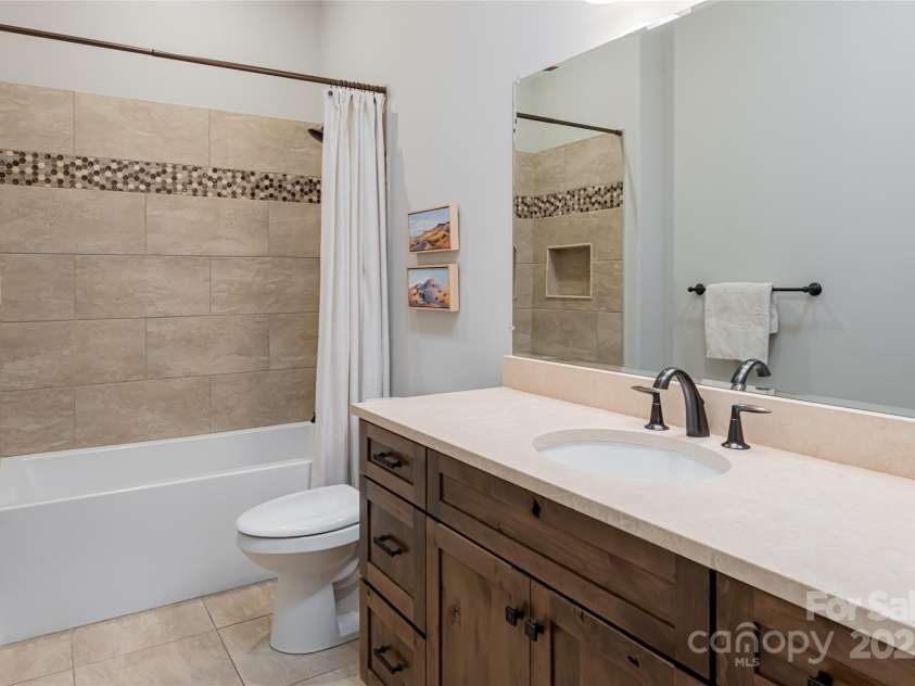 28 Woodland Aster Way, Asheville, NC 28804.  MLS# CAR4212425, YatesRealty ID 26479. Guest bathroom