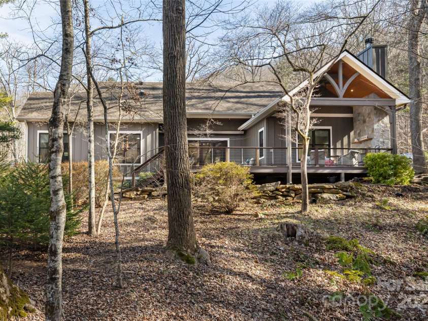 28 Woodland Aster Way, Asheville, NC 28804.  MLS# CAR4212425, YatesRealty ID 26479. Paths lead you down to the creek and studio