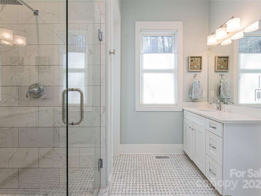 28 Woodland Aster Way, Asheville, NC 28804.  MLS# CAR4212425, YatesRealty ID 26479. Primary suite with luxury tile shower