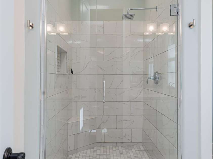 28 Woodland Aster Way, Asheville, NC 28804.  MLS# CAR4212425, YatesRealty ID 26479. Spacious glass enclosed luxury shower.