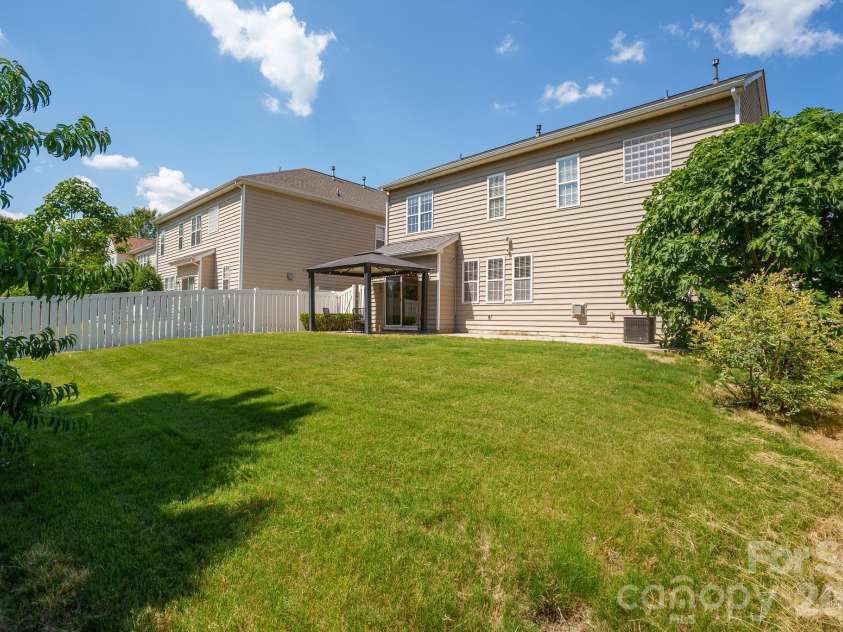 5110 Dragonfly Lane, Charlotte, NC 28277.  MLS# CAR4382717, YatesRealty ID 26480. Backyard
