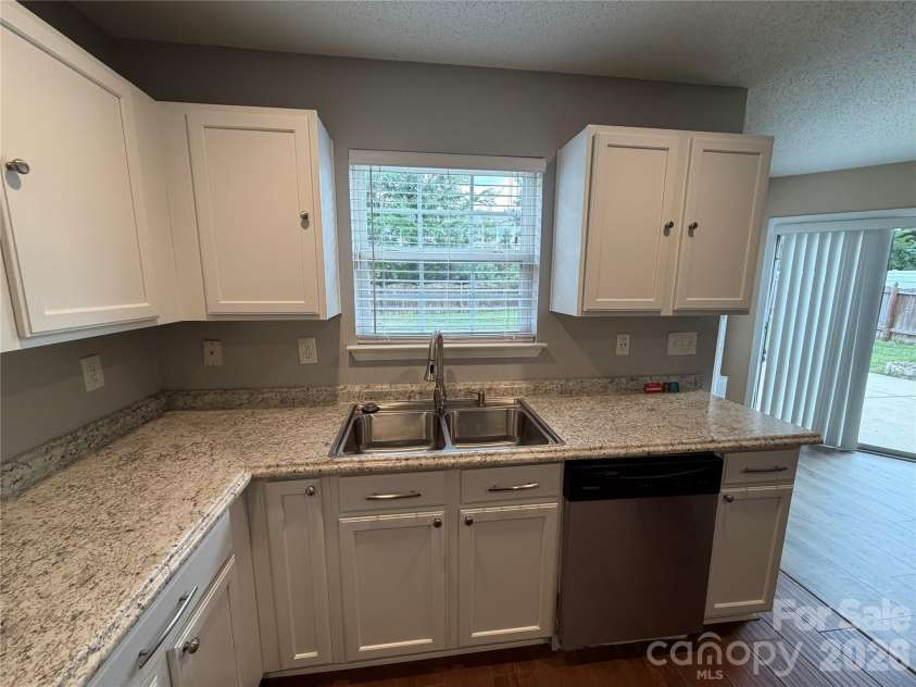 9233 Simonton Drive, Charlotte, NC 28269.  MLS# CAR4384205, YatesRealty ID 26481. 