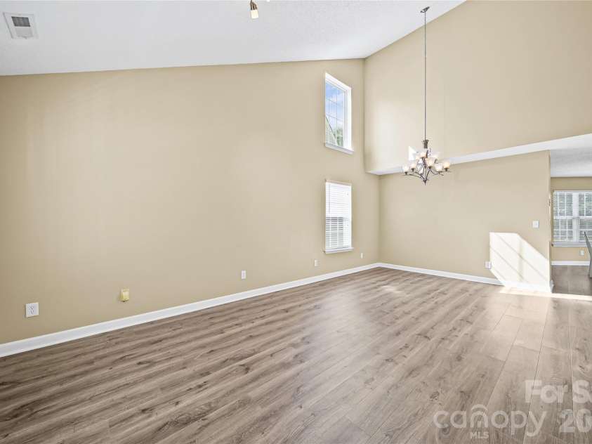 9233 Simonton Drive, Charlotte, NC 28269.  MLS# CAR4384205, YatesRealty ID 26481. Living room