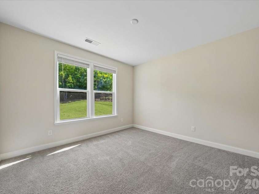 2318 Excalibur Drive, Indian Land, SC 29707.  MLS# CAR4383670, YatesRealty ID 26482. Bedroom on Main Floor