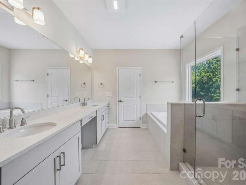 2318 Excalibur Drive, Indian Land, SC 29707.  MLS# CAR4383670, YatesRealty ID 26482. Primary Bathroom