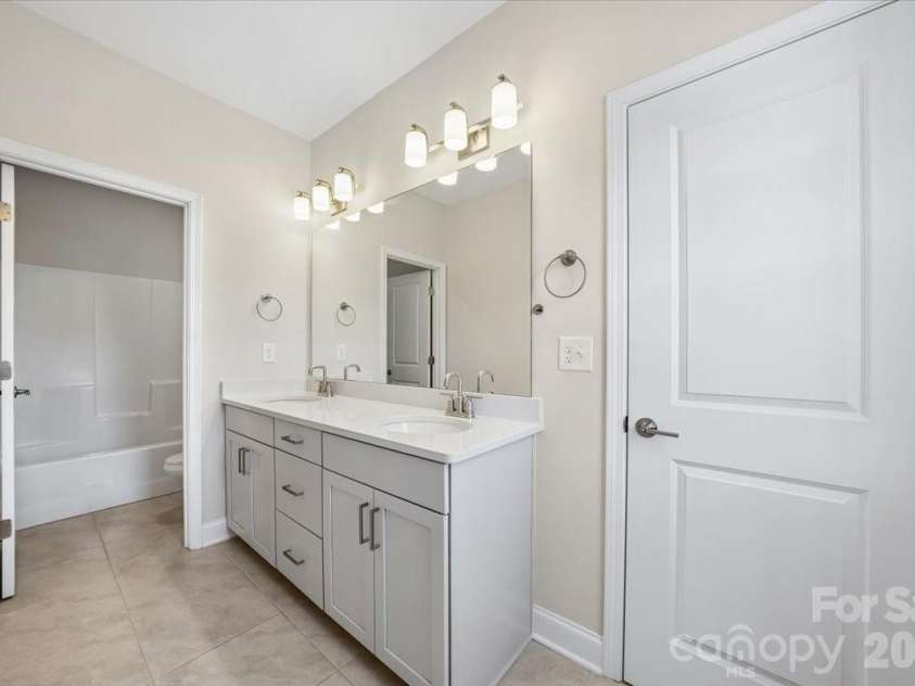 2318 Excalibur Drive, Indian Land, SC 29707.  MLS# CAR4383670, YatesRealty ID 26482. Second Bathroom