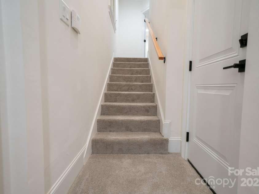 4901 Pine Ridge Road, Charlotte, NC 28226.  MLS# CAR4278391, YatesRealty ID 26490. Stairs to Main Primary