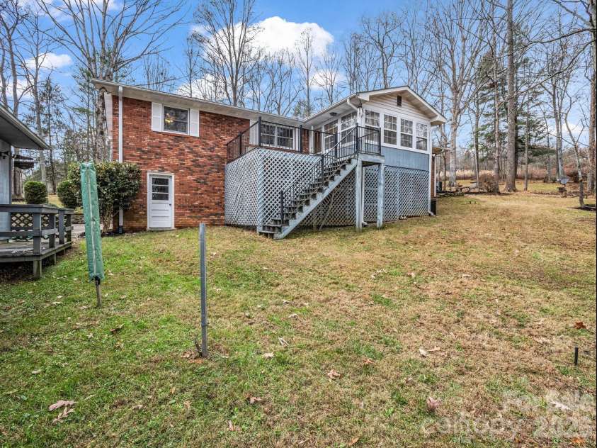 136 Old Tanglewood Trail, Hendersonville, NC 28739.  MLS# CAR4324799, YatesRealty ID 26492. Expansive back yard