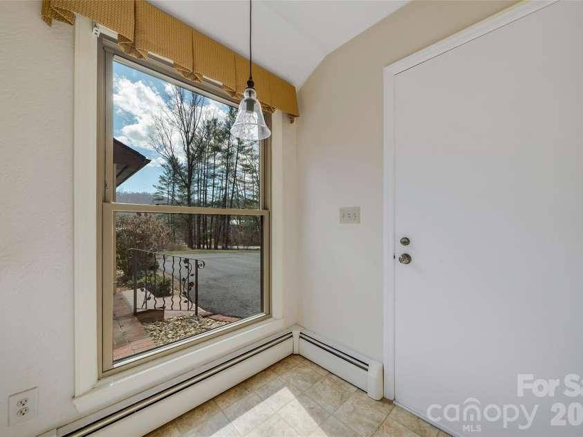 63 Pinecroft Road, Asheville, NC 28804.  MLS# CAR4352217, YatesRealty ID 26495. Breakfast nook with a mountain view