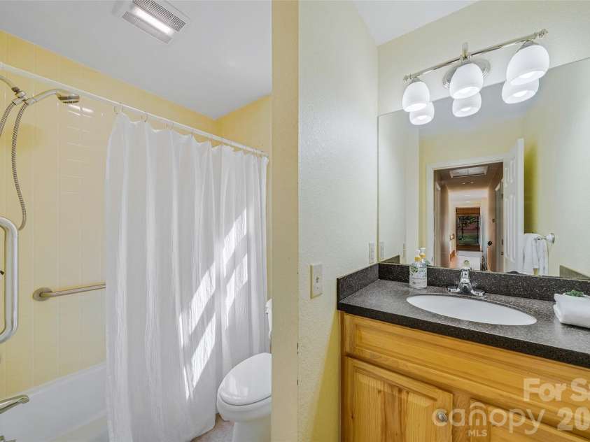63 Pinecroft Road, Asheville, NC 28804.  MLS# CAR4352217, YatesRealty ID 26495. Hall bath main level