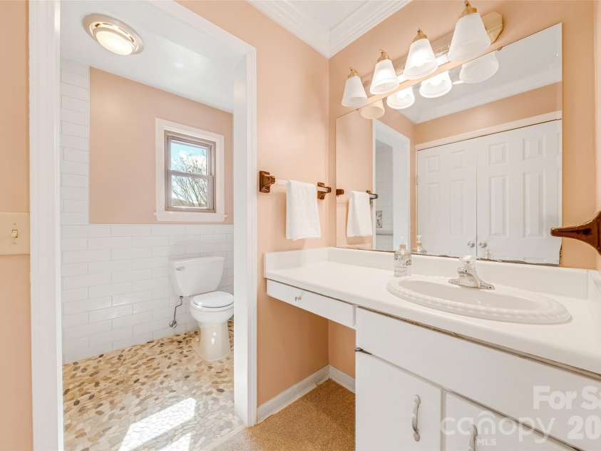 63 Pinecroft Road, Asheville, NC 28804.  MLS# CAR4352217, YatesRealty ID 26495. Primary bath