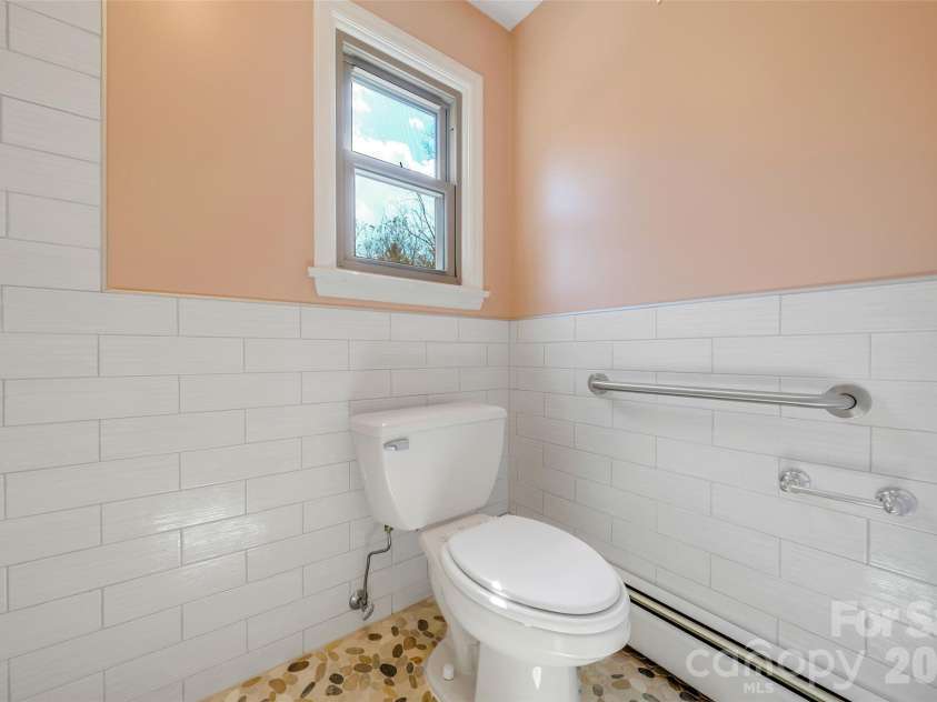 63 Pinecroft Road, Asheville, NC 28804.  MLS# CAR4352217, YatesRealty ID 26495. Primary Bath with handrails installed
