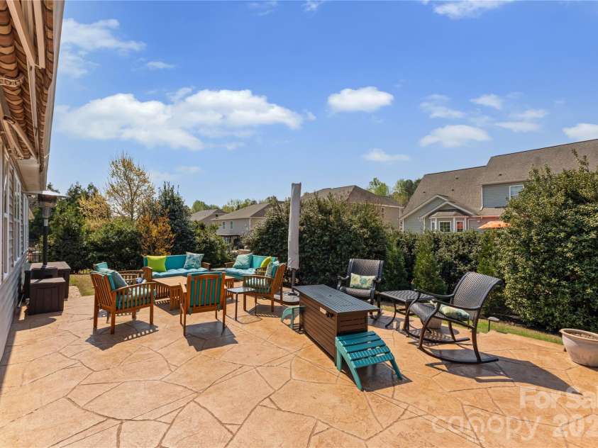596 Rosemary Lane, Tega Cay, SC 29708.  MLS# CAR4359622, YatesRealty ID 26497. Private backyard