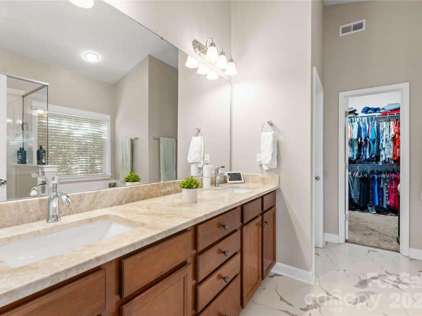 596 Rosemary Lane, Tega Cay, SC 29708.  MLS# CAR4359622, YatesRealty ID 26497. Taj Mahal countertop