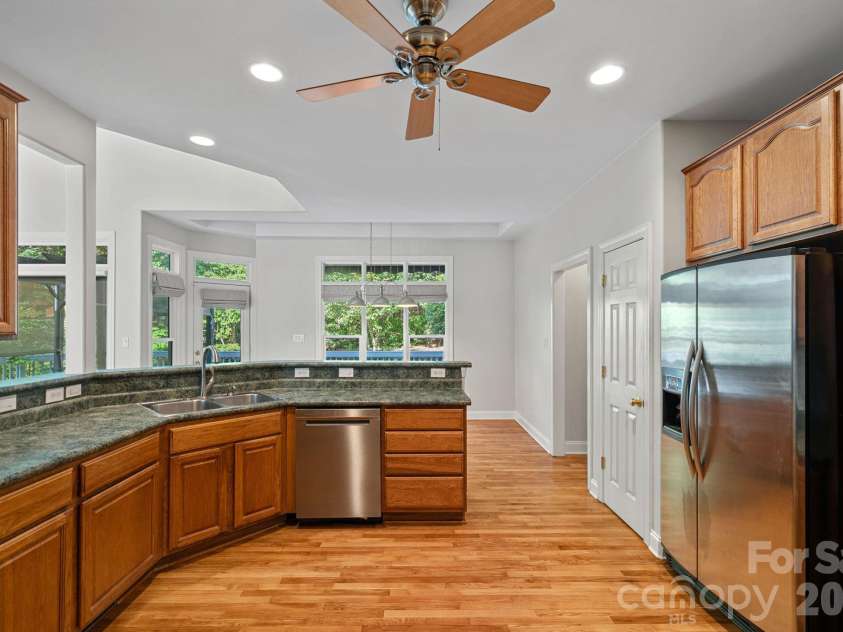 3889 Granite Street, Terrell, NC 28682.  MLS# CAR4367523, YatesRealty ID 26502. Kitchen has Hickory cabinets and Breakfast Room w/bar