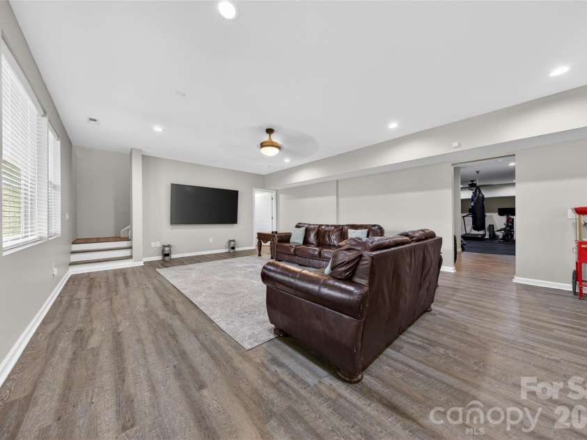 2166 Stratton Place, Fort Mill, SC 29708.  MLS# CAR4370672, YatesRealty ID 26503. Basement Great Room