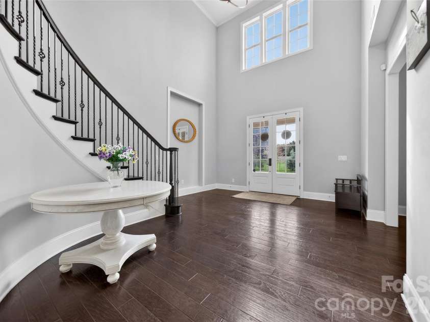 2166 Stratton Place, Fort Mill, SC 29708.  MLS# CAR4370672, YatesRealty ID 26503. Dramatic Curved Staircase