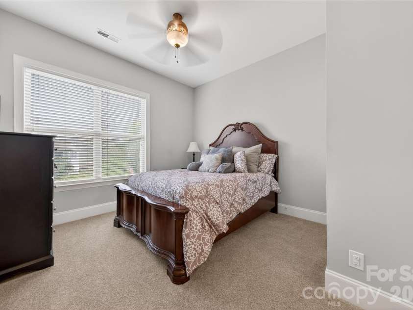 2166 Stratton Place, Fort Mill, SC 29708.  MLS# CAR4370672, YatesRealty ID 26503. First Floor Guest Suite