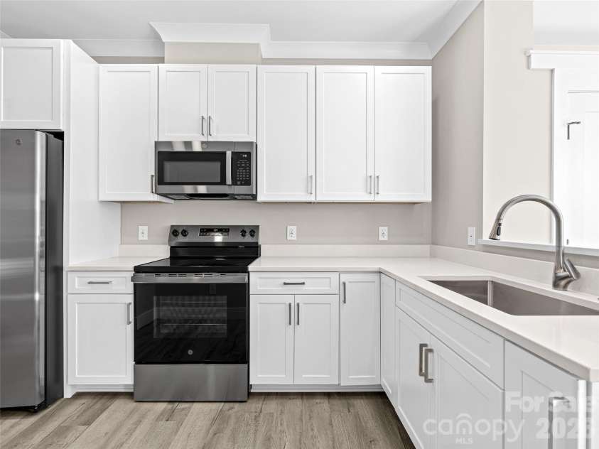 49 Al Dorf Drive, Weaverville, NC 28787.  MLS# CAR4372663, YatesRealty ID 26504. Lower Level Full Kitchen