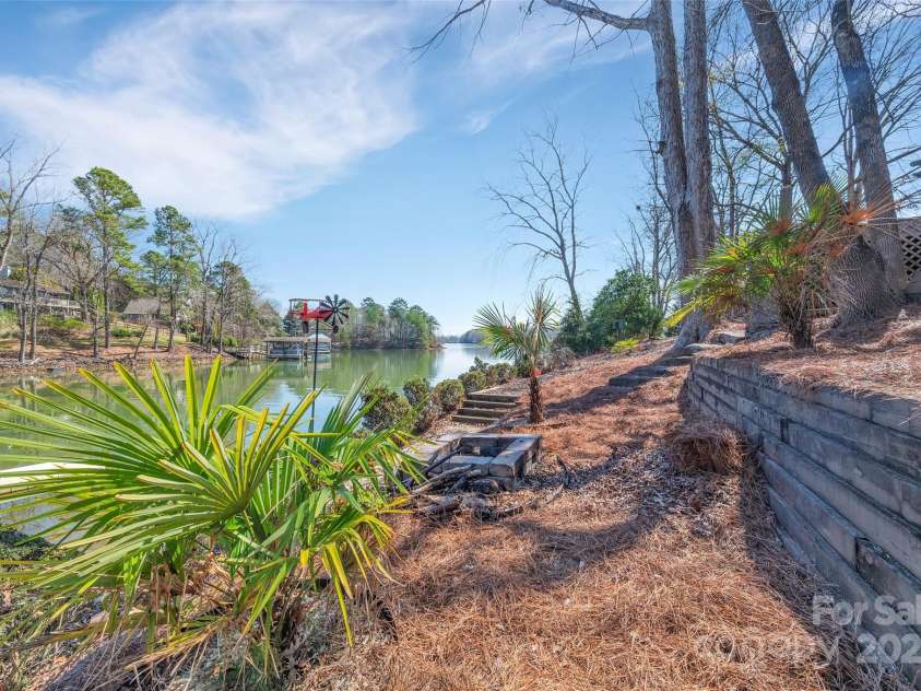 1077 Gauguin Lane, Tega Cay, SC 29708.  MLS# CAR4219217, YatesRealty ID 2651. Yard & firepit