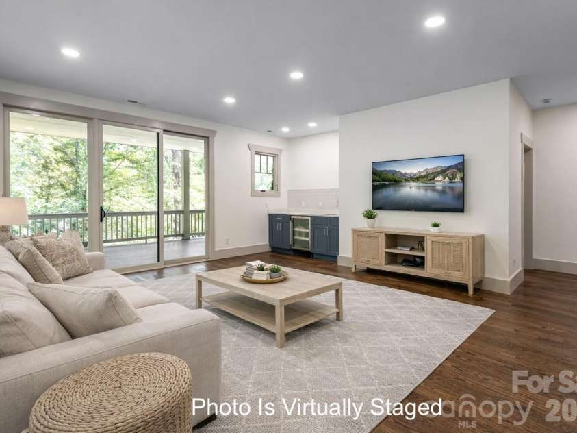 110 Unadilla Avenue, Asheville, NC 28803.  MLS# CAR4249602, YatesRealty ID 2651. Lower level family room with wet bar