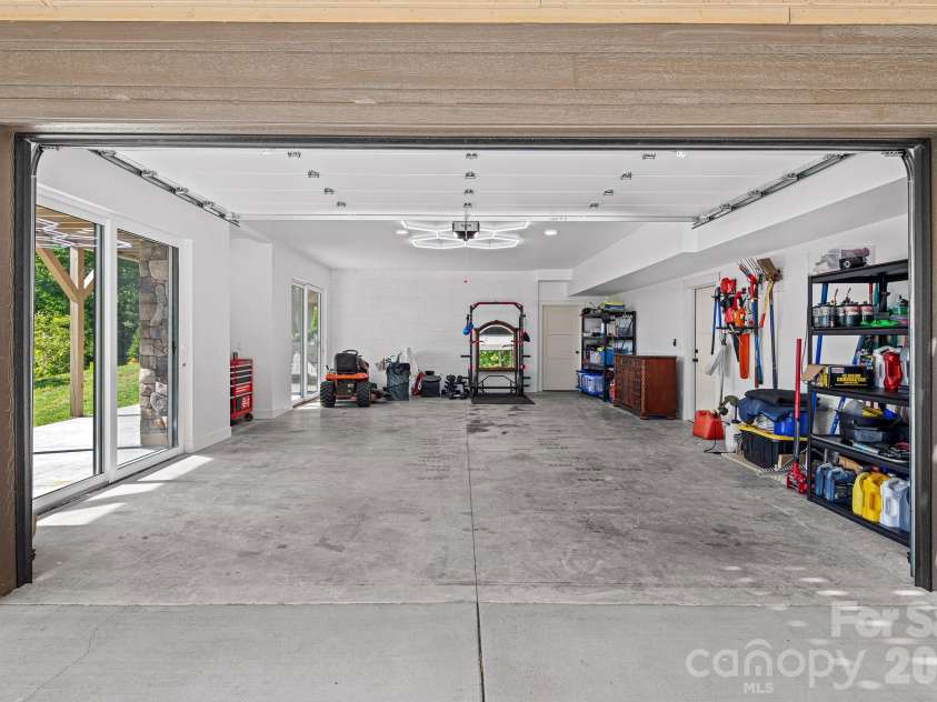 96 Crystal Lake Drive, Hendersonville, NC 28739.  MLS# CAR4383491, YatesRealty ID 26514. Spacious two car garage