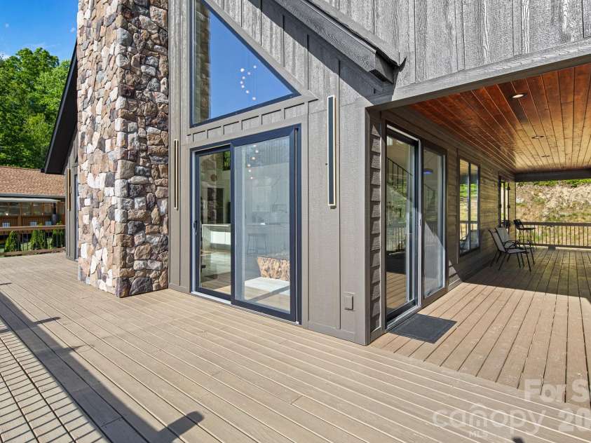 96 Crystal Lake Drive, Hendersonville, NC 28739.  MLS# CAR4383491, YatesRealty ID 26514. Wrap-around decking