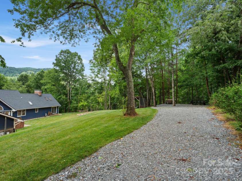 3 Neighborly Drive, Candler, NC 28715.  MLS# CAR4279454, YatesRealty ID 26517. Back Yard
