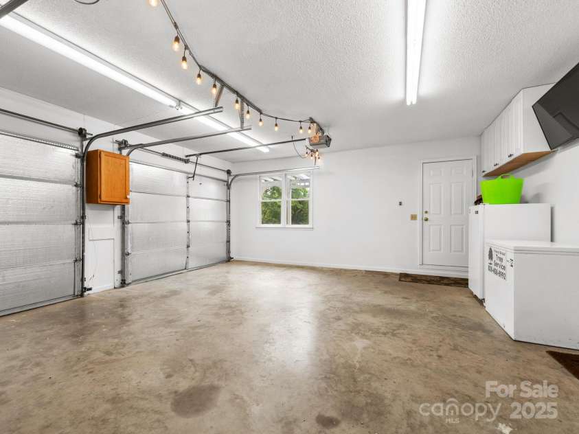 3 Neighborly Drive, Candler, NC 28715.  MLS# CAR4279454, YatesRealty ID 26517. Garage