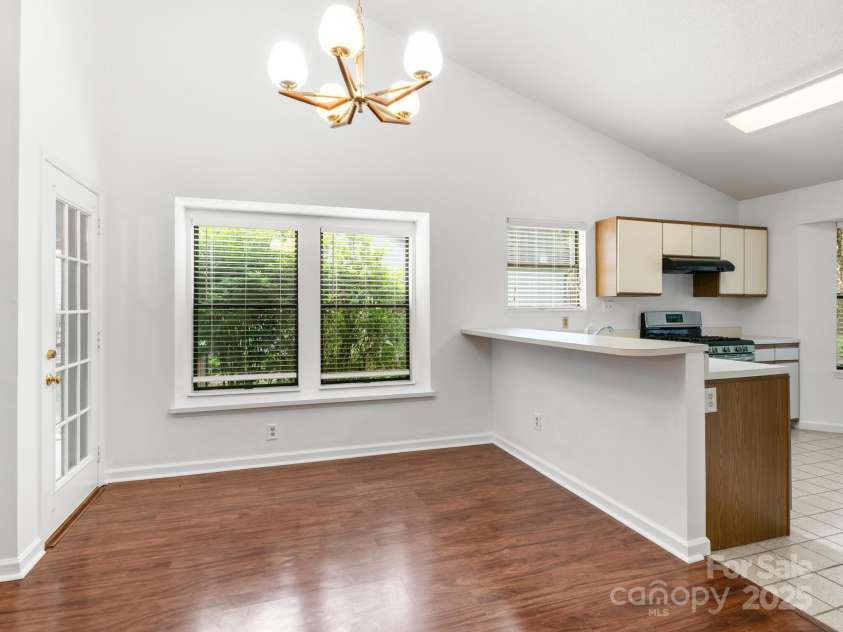111 Cimarron Drive, Asheville, NC 28803.  MLS# CAR4277597, YatesRealty ID 26521. Dining area with breakfast bar in kitchen