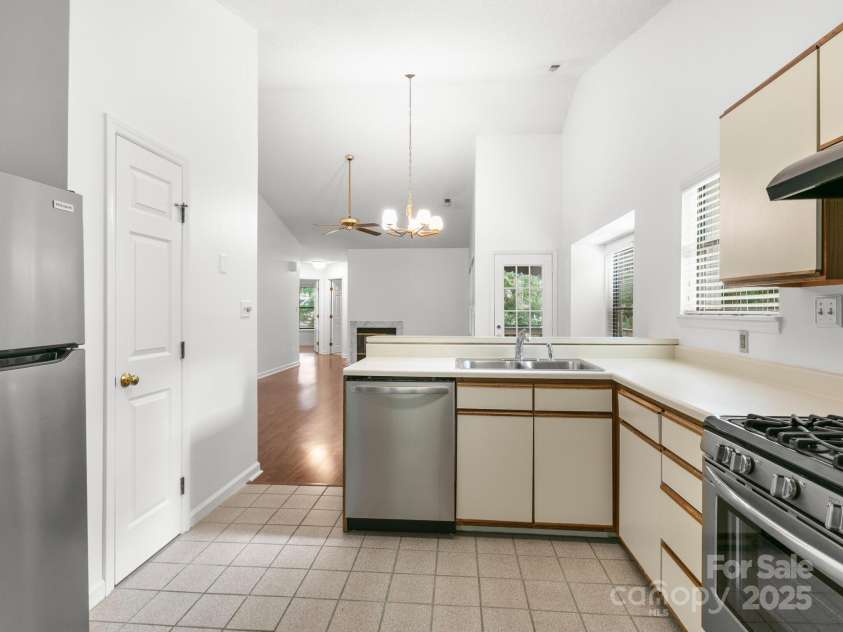 111 Cimarron Drive, Asheville, NC 28803.  MLS# CAR4277597, YatesRealty ID 26521. Kitchen view from the bay window