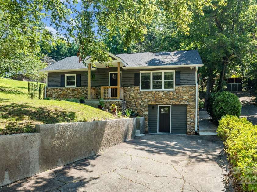 11 Upland Road, Asheville, NC 28804.  MLS# CAR4276545, YatesRealty ID 26522. 2nd Driveway and Guest Suite Entrance