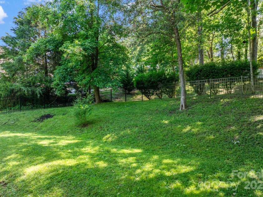 11 Upland Road, Asheville, NC 28804.  MLS# CAR4276545, YatesRealty ID 26522. Fenced Portion of the Backyard