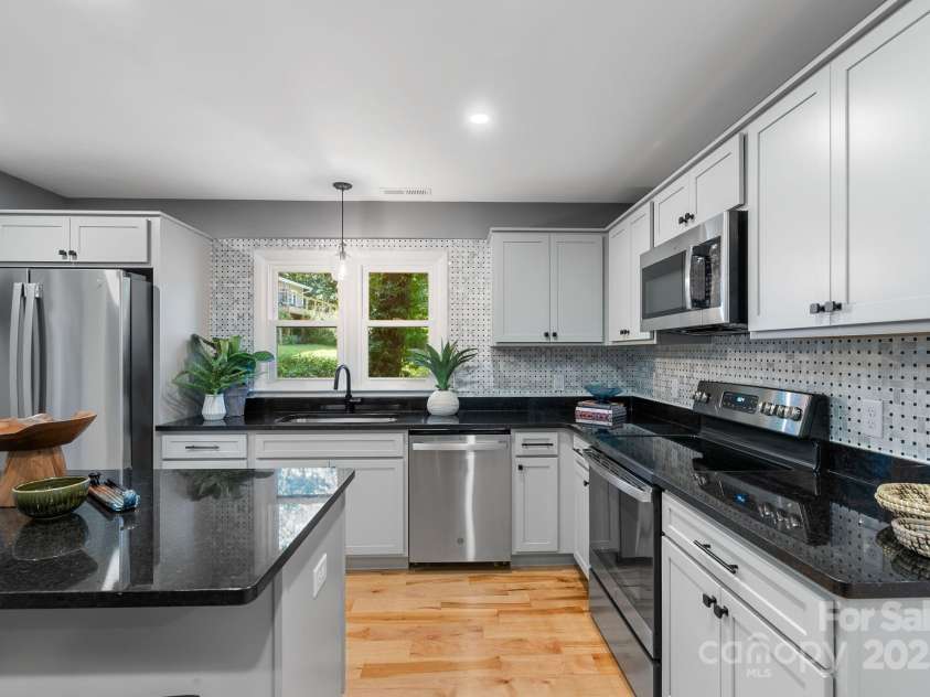 11 Upland Road, Asheville, NC 28804.  MLS# CAR4276545, YatesRealty ID 26522. Plenty of Storage and Workspace